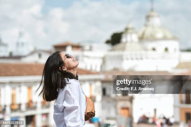 portrait of woman smiling in the square of san francisco de quito - ecuador people stock pictures, royalty-free photos & images