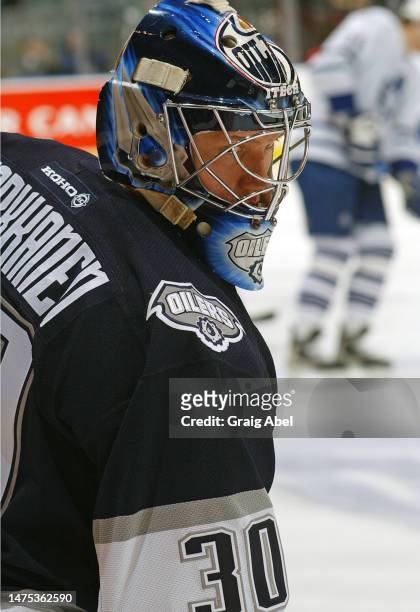Jussi Markkanen of the Edmonton Oilers skates against the Toronto Maple Leafs during NHL game action on February 11, 2003 at Air Canada Centre in...