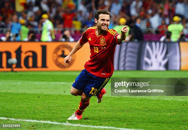 Juan Mata of Spain celebrates after scoring his team's fourth goal during the UEFA EURO 2012 final match between Spain and Italy at the Olympic...