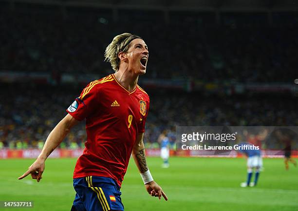 Fernando Torres of Spain celebrates scoring his side's third goal during the UEFA EURO 2012 final match between Spain and Italy at the Olympic...