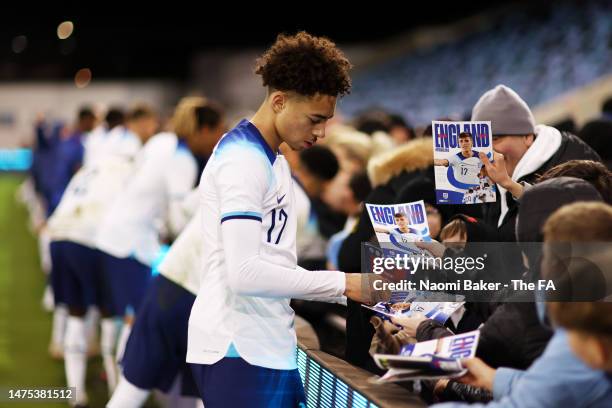 Sam Edozie of England signs autographs after the International Friendly match between England and Germany at Manchester City Academy Stadium on March...