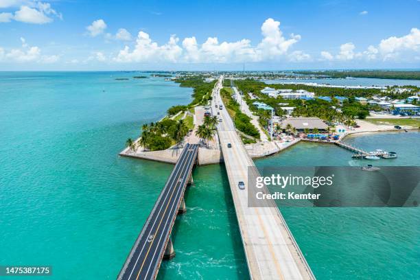 aerial view of the island marathon key and the seven mile bridge - florida keys stock pictures, royalty-free photos & images