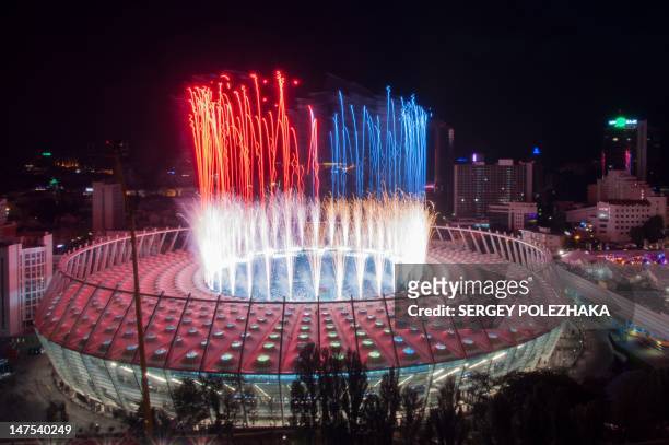 Fireworks are let off at the Olympic stadium in Kiev after the final between Italy and Spain of the Euro 2012 championchips on July 1, 2012. AFP...