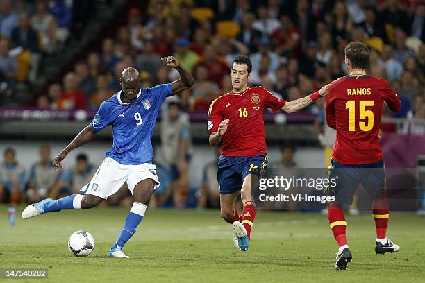 Mario Balotelli of Italy, Sergio Busquets of Spain, Sergio Ramos of Spain during the UEFA EURO 2012 Final match between Spain and Italy at the NSK...