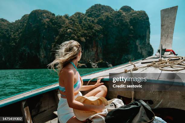 young caucasian woman in thai taxi boat in krabi, thailand - krabi provincie stockfoto's en -beelden