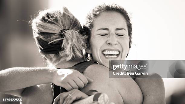 powerful marathon finish line celebration moment - marathon runner finish line stock pictures, royalty-free photos & images