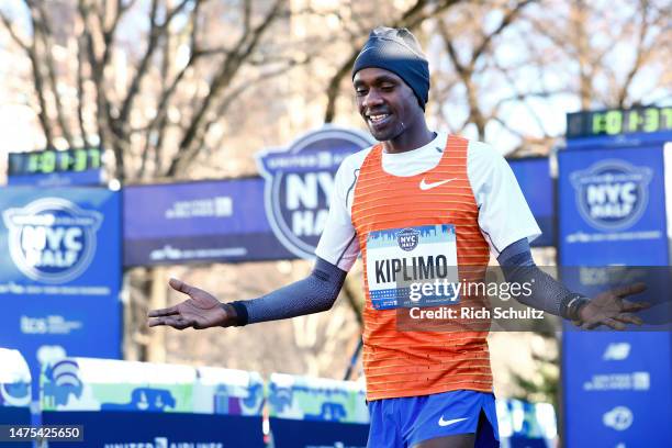 Jacob Kiplimo of Uganda crosses the finish line to win the Mens United Airlines NYC Half Marathon on March 19, 2023 in New York City.