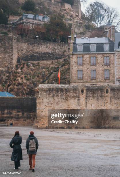 mont-saint michel on a rainy day - loire atlantique stock pictures, royalty-free photos & images