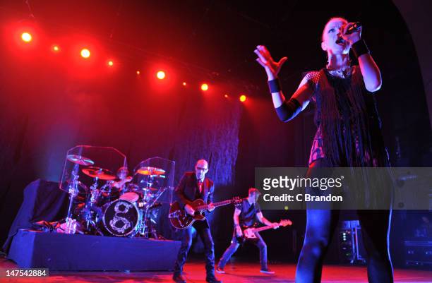 Butch Vig, Duke Erikson, Eric Avery and Shirley Manson of Garbage performs on stage at Brixton Academy on July 1, 2012 in London, United Kingdom.