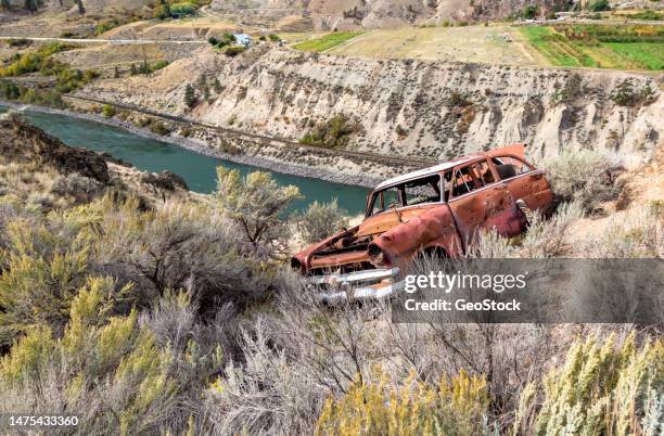 car wreck in a high desert landscape - stock photo car chrome bumper stock-fotos und bilder