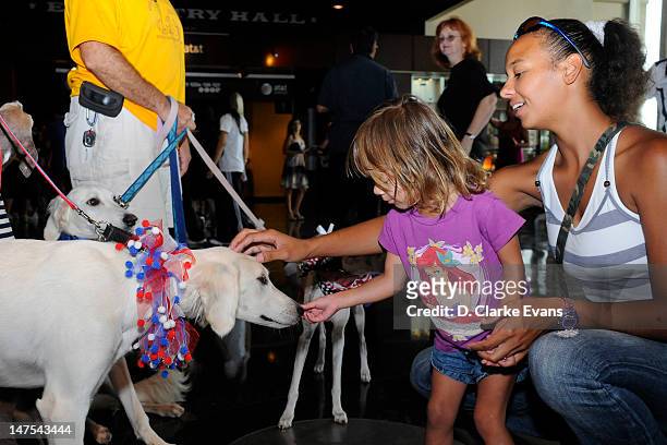 In celebration of Hoops and Hounds, fans of the San Antonio Silver Stars bring their dogs to the game against the Minnesota Lynx at the AT&T Center...