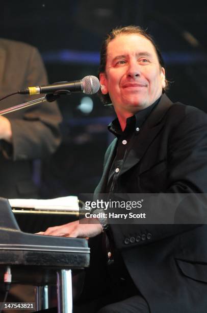 Jools Holland performs on stage during Cornbury Festival at Great Tew Estate on July 1, 2012 in Oxford, United Kingdom.