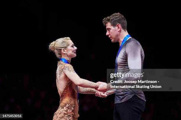 Alexa Knierim and Brandon Frazier of the United States react in the Pairs Free Skating medal ceremony during the ISU World Figure Skating...