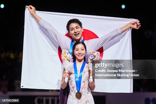 Riku Miura and Ryuichi Kihara of Japan pose in the Pairs medal ceremony during the ISU World Figure Skating Championships at Saitama Super Arena on...