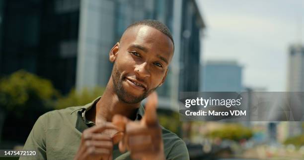 city, smile and portrait of black man point for business motivation, success and confidence in urban town. happy, entrepreneur and face of nigerian male outdoors with startup goals, vision and target - happy people africa stockfoto's en -beelden