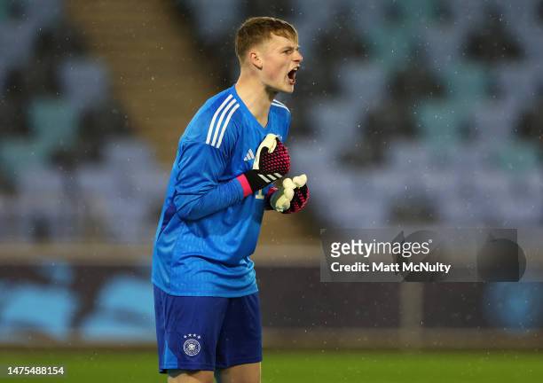 Jonas Urbig of Germany reacts during the International Friendly between England U20s and Germany U20s at Manchester City Academy Stadium on March 22,...