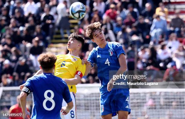 Lepnardo Bovo of Italy competes for the ball with Victor Stancovici of Romania during International Friendly match between Italy and Romania at...