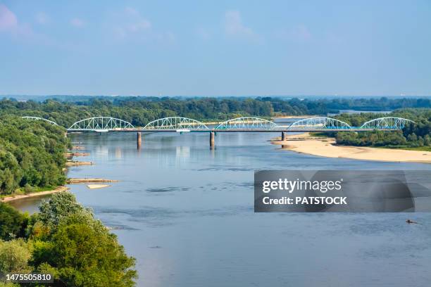 metal bridge on a river - cieszyn stock pictures, royalty-free photos & images