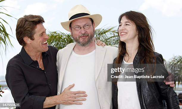 Actor Willem Dafoe, director Lars Von Trier and actress Charlotte Gainsbourg attend the 'Antichrist' photo call at the Palais des Festivals during...