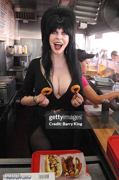 Actress Cassandra Peterson attends the launch of her new signature Elvira hot dog at Pink's Hot Dogs on July 1, 2012 in Los Angeles, California.