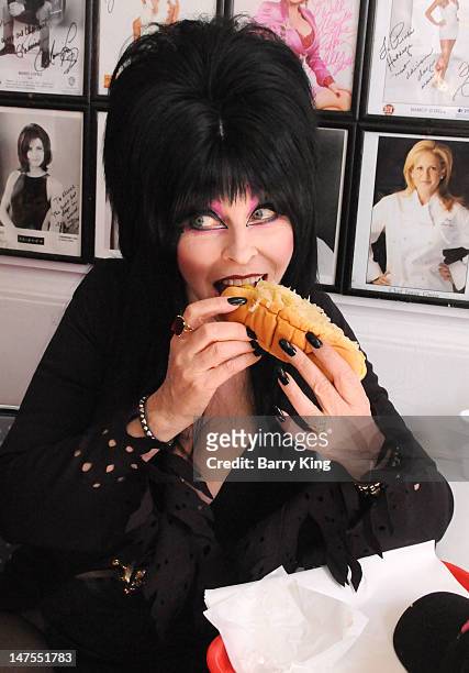 Actress Cassandra Peterson attends the launch of her new signature Elvira hot dog at Pink's Hot Dogs on July 1, 2012 in Los Angeles, California.