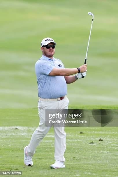George Coetzee of South Africa plays his second shot on the 8th hole during Day One of the Jonsson Workwear Open at The Club at Steyn City on March...