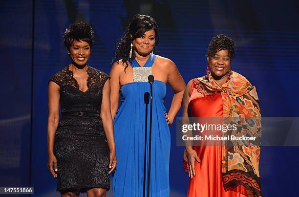 Presenters Angela Bassett; Lela Rochon and Loretta Devine speak onstage during the 2012 BET Awards at The Shrine Auditorium on July 1, 2012 in Los...