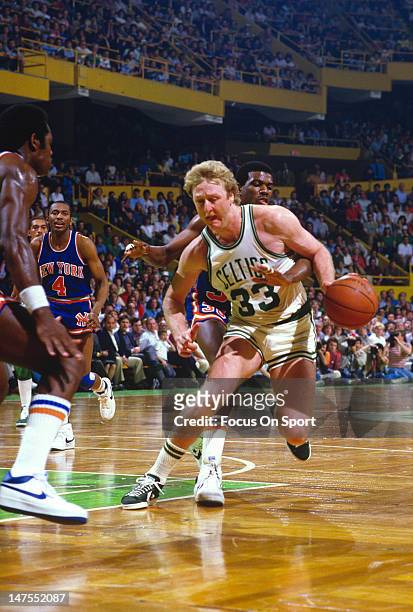 Larry Bird of the Boston Celtics in action against the New York Knicks during an NBA basketball game circa 1984 at The Boston Garden in Boston...