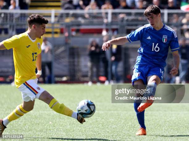 Filippo Saiani of Italy competes for the ball with Alberto-Constantin Calin of Romania during the International Friendly match between Italy and...