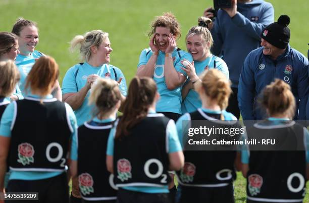 Sarah Hunter of England reacts as the team huddle during an England Red Roses Training Session at Penny Hill Park on March 23, 2023 in Bagshot,...