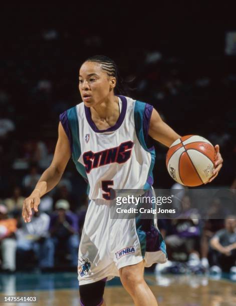 Dawn Staley, Guard for the Charlotte Sting in motion dribbling the basketball during the WNBA Eastern Conference basketball game against the New York...