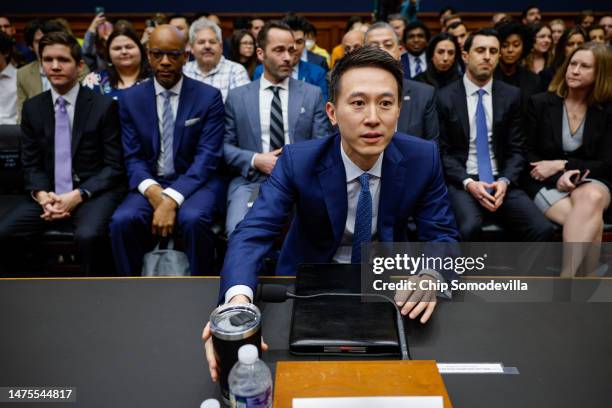TikTok CEO Shou Zi Chew prepares to testify before the House Energy and Commerce Committee in the Rayburn House Office Building on Capitol Hill on...