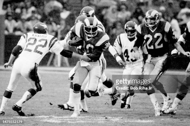 Rams RB Lawrence McCutcheon on running play during rainstorm at NFC Playoff Game between Los Angeles Rams and Minnesota Vikings, December 26, 1977 in...