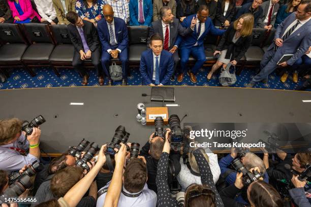 TikTok CEO Shou Zi Chew prepares to testify before the House Energy and Commerce Committee in the Rayburn House Office Building on Capitol Hill on...