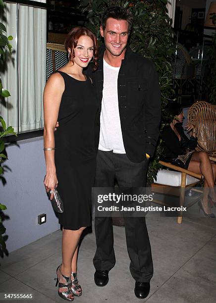 Amanda Righetti and Owain Yeoman arrive at TV GUIDE Magazine's Hot List Party at SLS Hotel on November 10, 2009 in Beverly Hills, California.