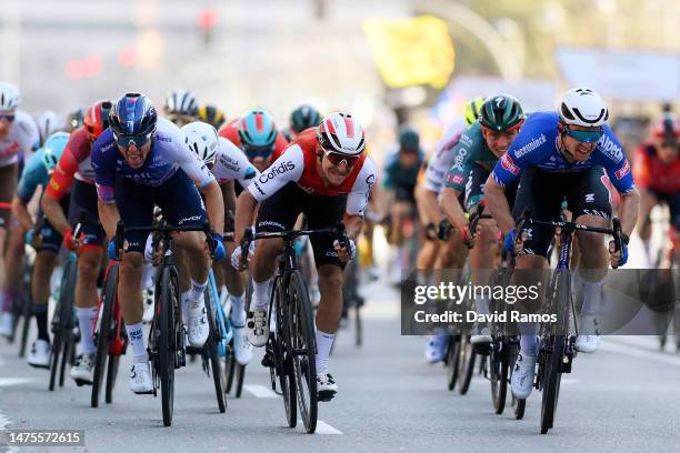 Corbin Strong of New Zealand and Team Israel-Premier Tech, Bryan Coquard of France and Team Cofidis and Kaden Groves of Australia and Team...