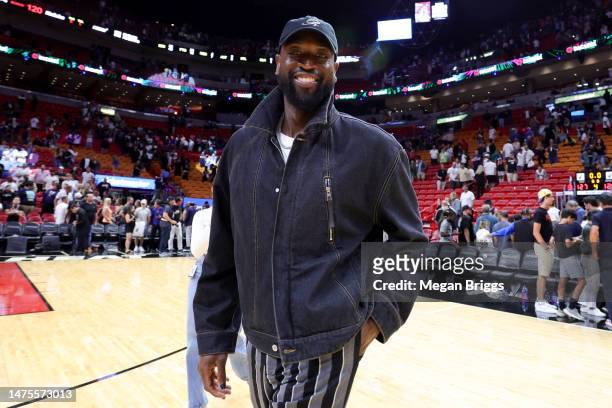 Former Miami Heat player Dwyane Wade attends a game between the New York Knicks and Miami Heat at Miami-Dade Arena on March 22, 2023 in Miami,...