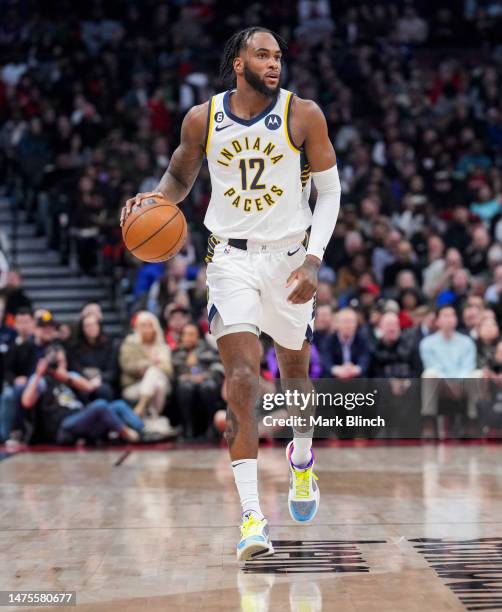 Oshae Brissett of the Indiana Pacers dribbles against the Toronto Raptors during the first half of their basketball game at the Scotiabank Arena on...