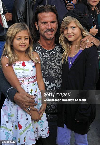 Lorenzo Lamas, Victoria Lamas and Isabella Lorenza Lamas attend the Famous Cupcakes Beverly Hills grand Opening hosted by the Kardashian Family on...
