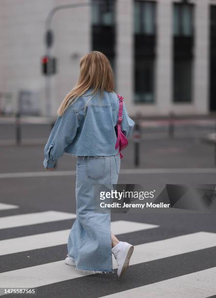 Tanja Comba seen wearing Agolde light blue denim long skirt, Agolde light blue cropped matching denim jacket via Aest Store, Balenciaga pink leather...