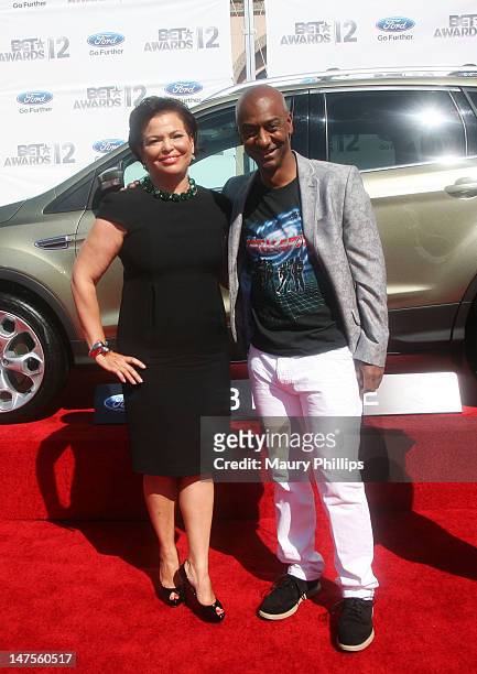 Networks Chairman & CEO Debra L. Lee and BET Awards executive producer Stephen Hill arrive at the 2012 BET Awards at The Shrine Auditorium on July 1,...