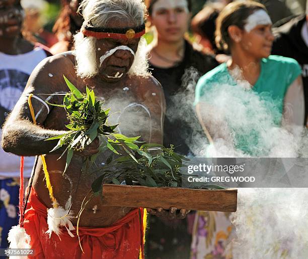 Traditional indigenous Australian smoking ceremony is performed during the opening of NAIDOC Week in Sydney on July 2, 2012. NAIDOC Week, held across...