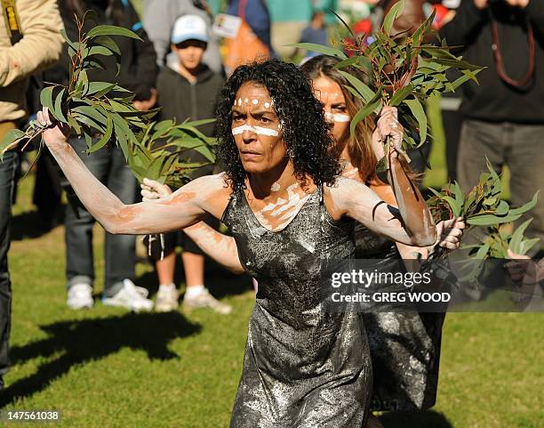 Dancers from the Jannawi Dance group perform during the opening of NAIDOC Week in Sydney on July 2, 2012. NAIDOC Week, held across Australia each...