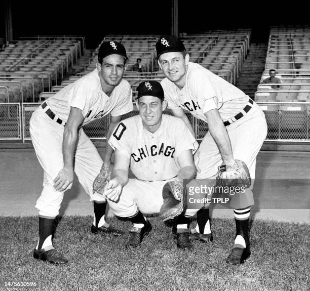 Shortstop Luis Aparicio, catcher Sherm Lollar and second baseman Nellie Fox, of the Chicago White Sox, pose for a portrait prior to an MLB game...