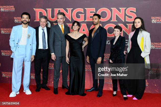 Justice Smith, Hugh Grant, Chris Pine, Michelle Rodriguez, Rege-Jean Page, Sophia Lillis and Daisy Head attend the "Dungeons & Dragons: Honour Among...