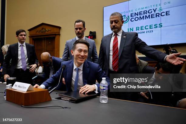 TikTok CEO Shou Zi Chew takes a break from testifying before the House Energy and Commerce Committee with Vice President for Public Policy Michael...