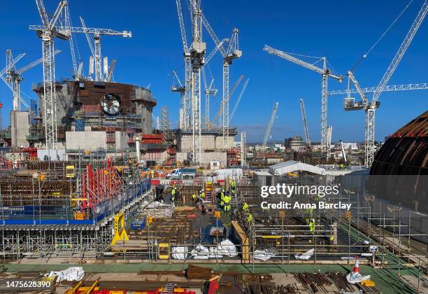 Cranes surround one of the two reactors being constructed at Hinkley Point C on October 09, 2022 in Bridgwater, England. The first new nuclear power...