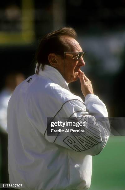 Team Owner and General Manager Al Davis of the Los Angeles Raiders follows the action in the game between the Los Angeles Raiders vs Philadelphia...