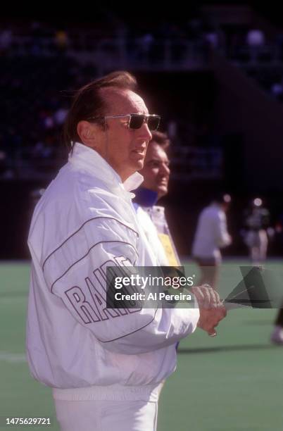 Team Owner and General Manager Al Davis of the Los Angeles Raiders follows the action in the game between the Los Angeles Raiders vs Philadelphia...