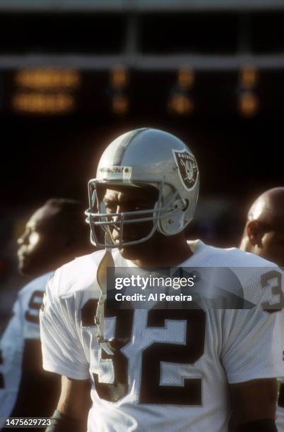 Running Back Marcus Allen of the Los Angeles Raiders follows the action in the game between the Los Angeles Raiders vs Philadelphia Eagles on...